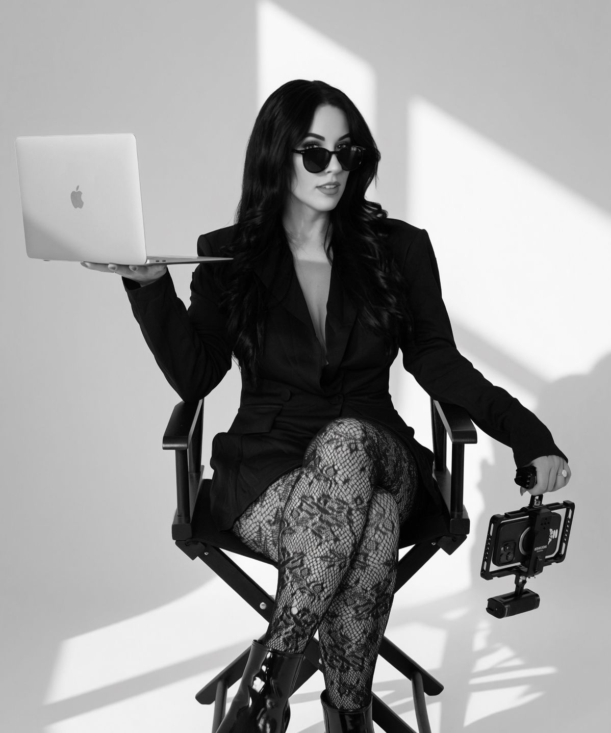 Ophelia Haus creative direction in the studio with laptop and phone camera rig